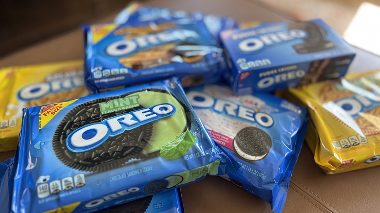 various packages of Oreo cookies in a pile