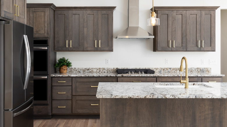 modern kitchen with dark gray cabinets
