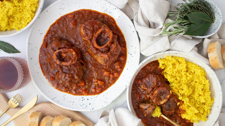 Ossobuco al pomodoro served with saffron rice