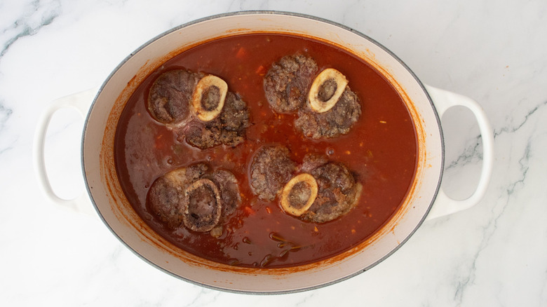 Beef shanks and pomodoro sauce in Dutch oven