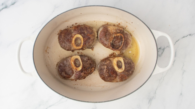 Seared beef shanks in Dutch oven
