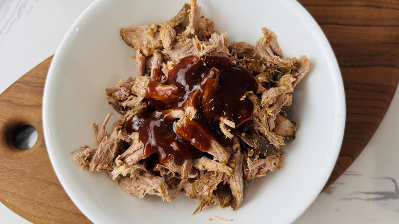 BBQ sauce added to pulled pork