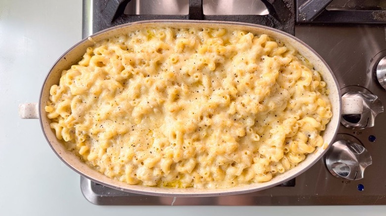 3-ingredient baked mac & cheese in serving dish on stovetop
