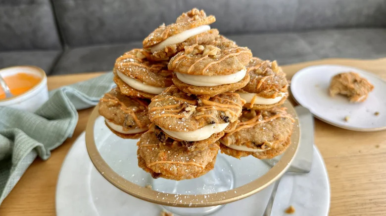 Carrot cake sandwich cookies on a platter