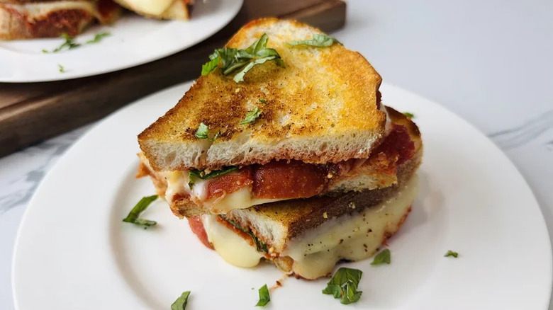Pepperoni pizza grilled cheese on a plate