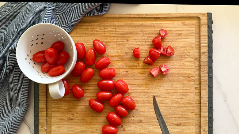 tomatoes on cutting board
