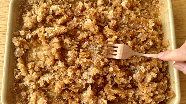 Scraping frozen coffee granita