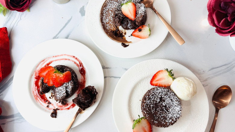 Chocolate lava cakes on plates