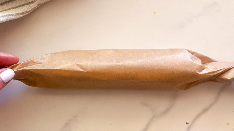 rolled up butter in parchment