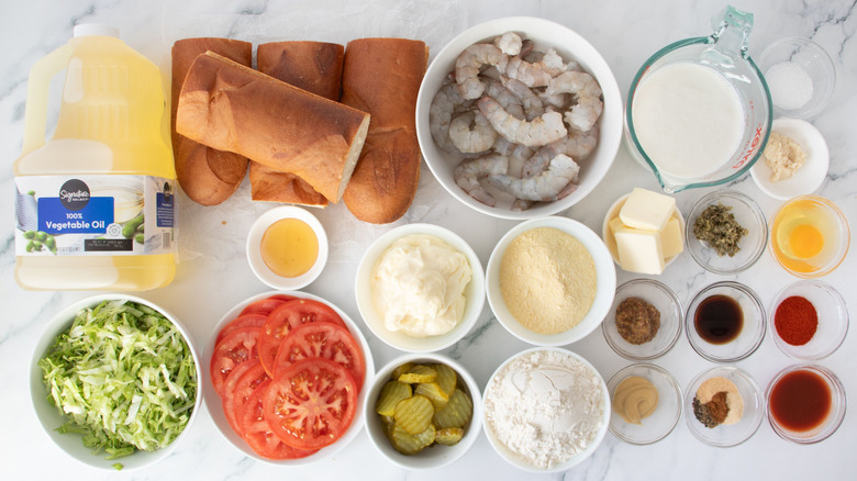 Ingredients for fried shrimp po' boy sandwiches