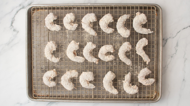 Breaded shrimp on wire rack