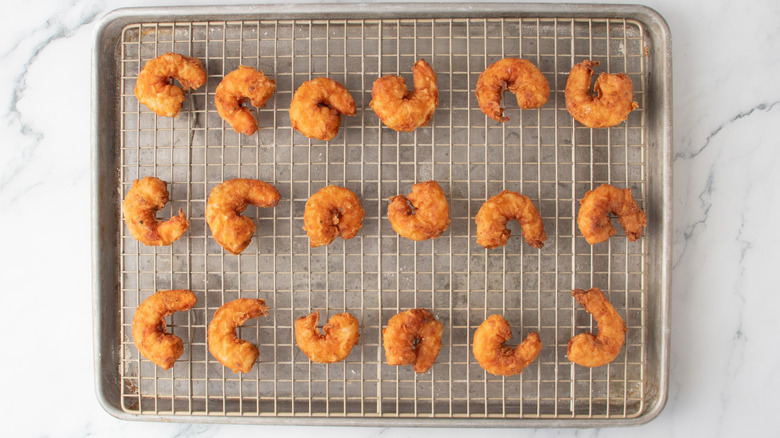 Fried shrimp on wire rack