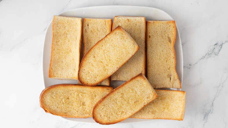 Toasted bread pieces on plate