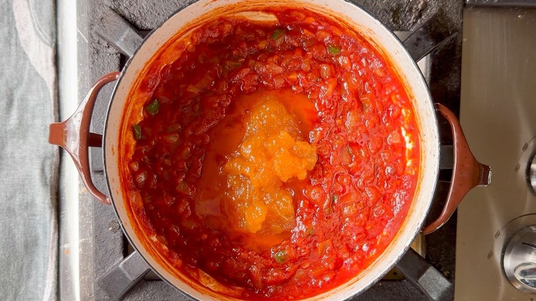 Honey bourbon BBQ sauce in pot on stovetop