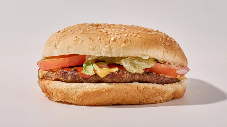 A Burger King Whopper on a plain background.