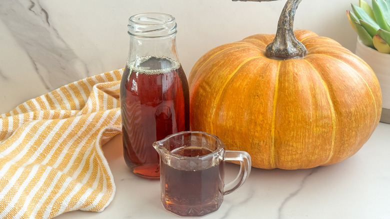 syrup next to pumpkin
