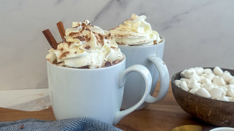 2 mugs of hot chocolate