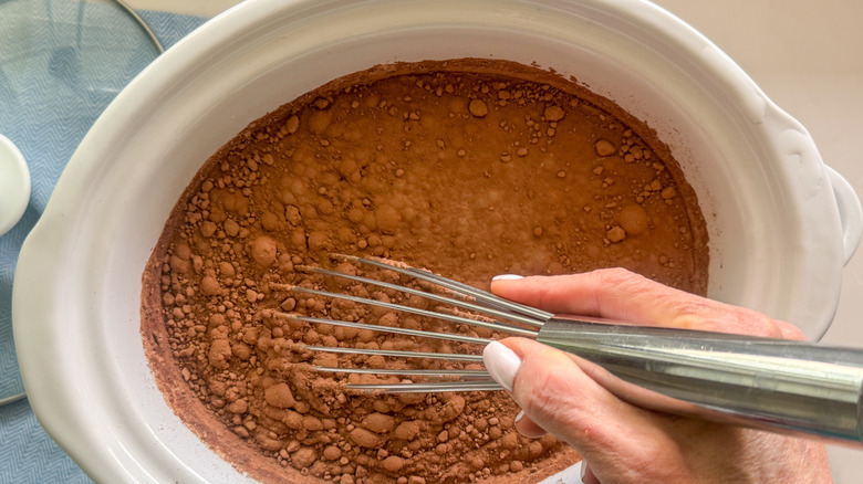 hand whisking hot chocolate