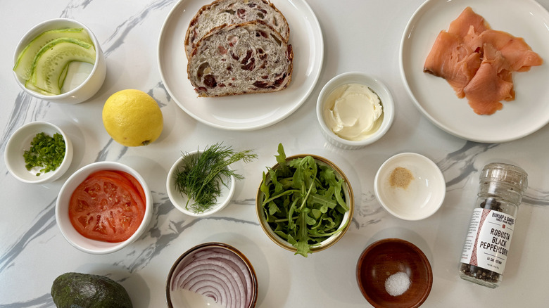 Ingredients for smoked salmon sandwich and fixings
