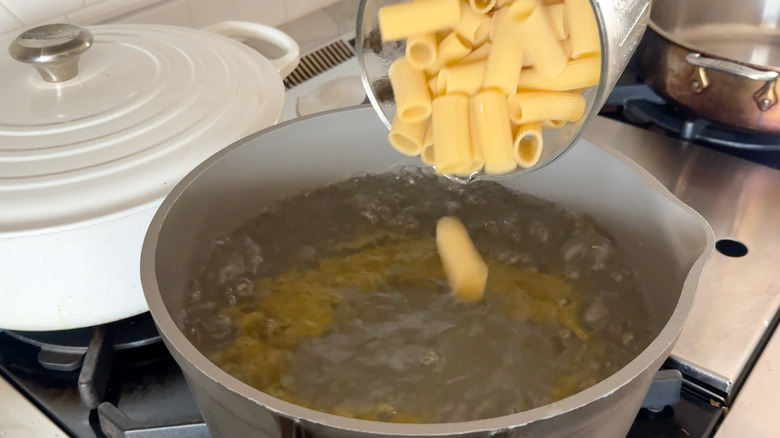 pasta pouring into pot