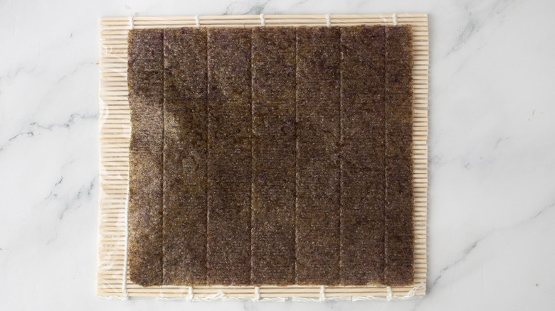 Nori sheet on top of bamboo sushi mat