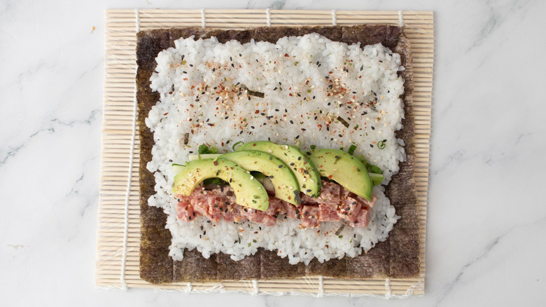 Unrolled spicy tuna roll topped with togarashi seasoning