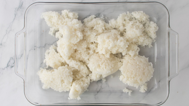 Clumps of rice in casserole dish