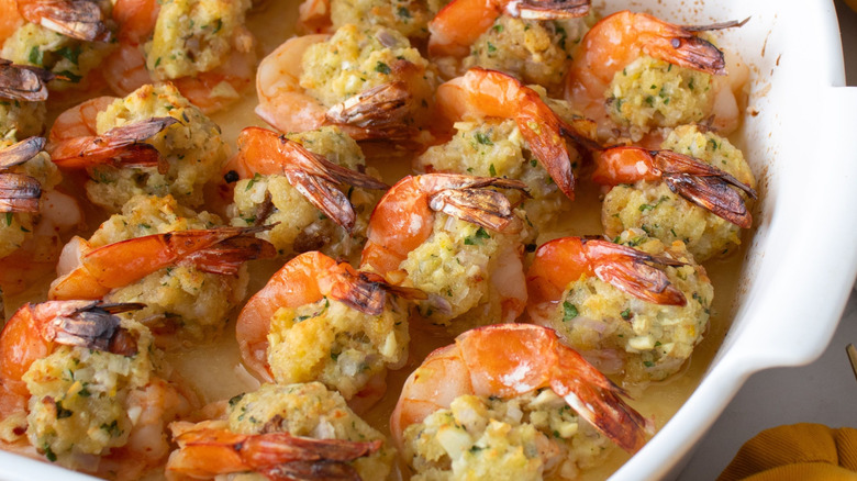 Stuffed shrimp scampi in casserole dish