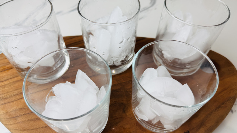 ice in five glasses