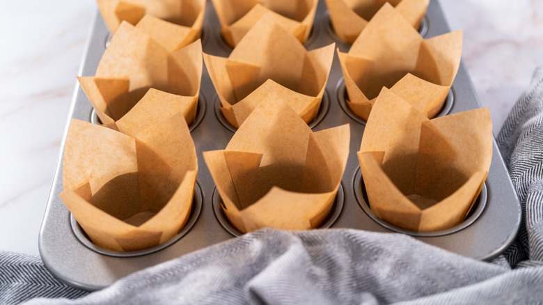 parchment paper liners in a baking tin