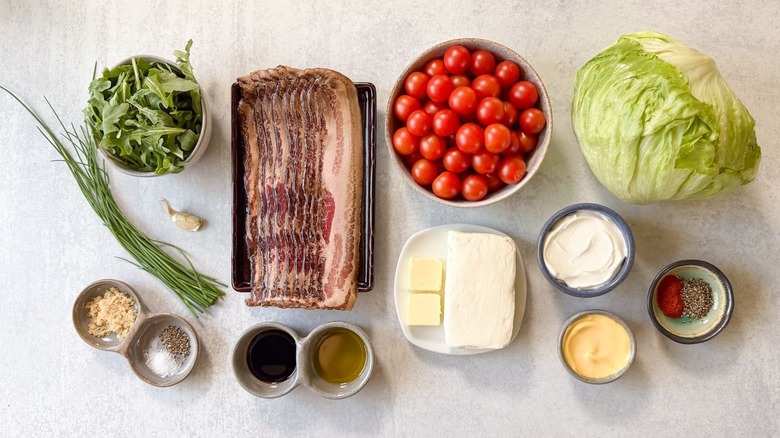 Over-the-top BLT dip ingredients on countertop