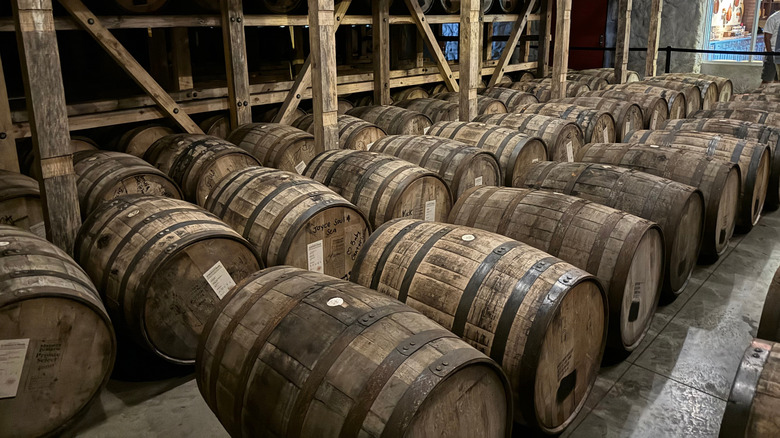 Bourbon barrels in warehouse