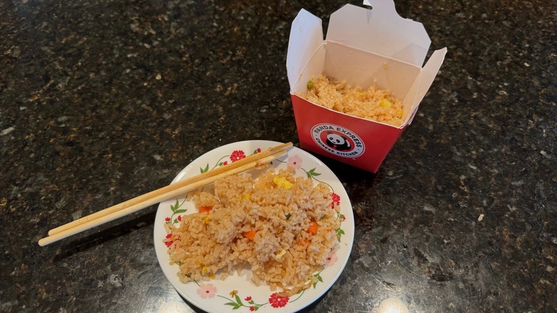 Panda Express takeout box and plate of fried rice