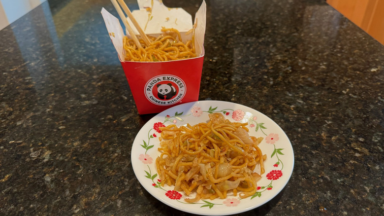 Panda Express takeout box and plate with chow mein