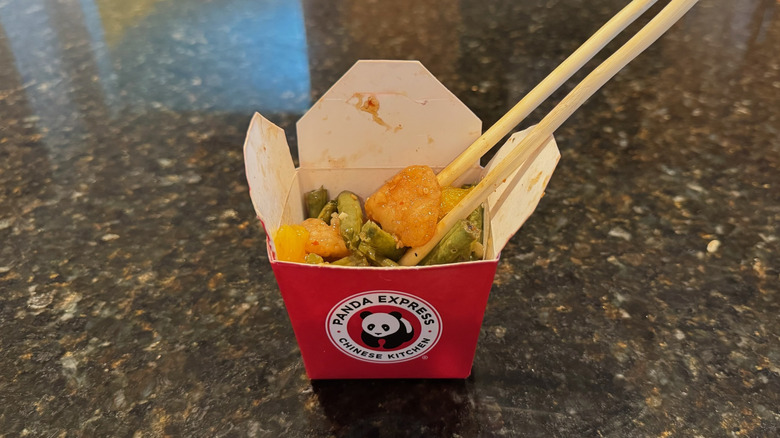 Panda Express takeout box with Honey Sesame Chicken Breast