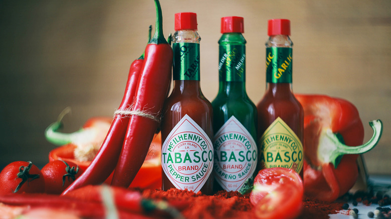 A line of Tabasco sauce bottles.