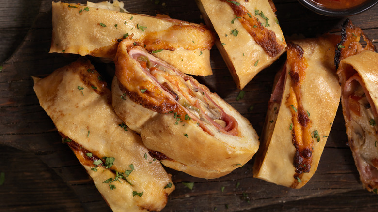 sliced pepperoni roll with sauce