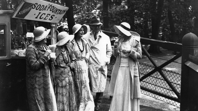 Women at a soda fountain 