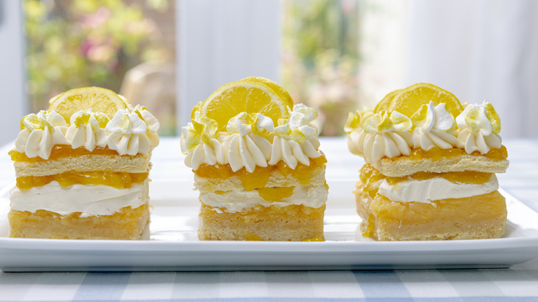Lemon pie slices on a plate.