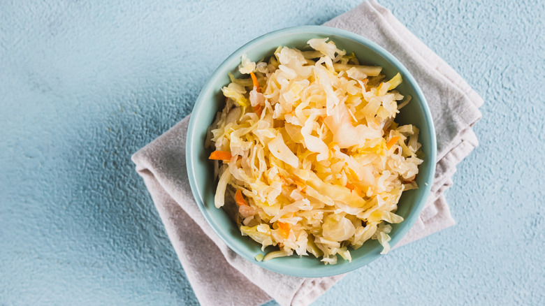 A bowl of pickled cabbage.