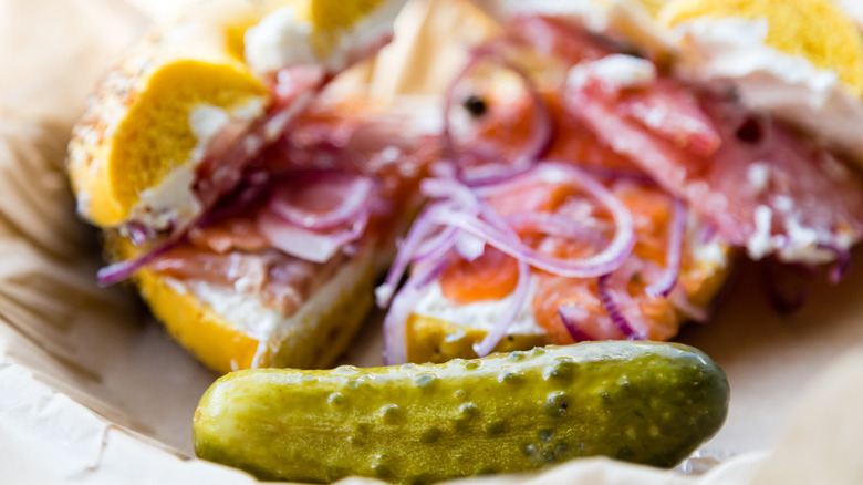 Lox bagel with pickled onions and pickle