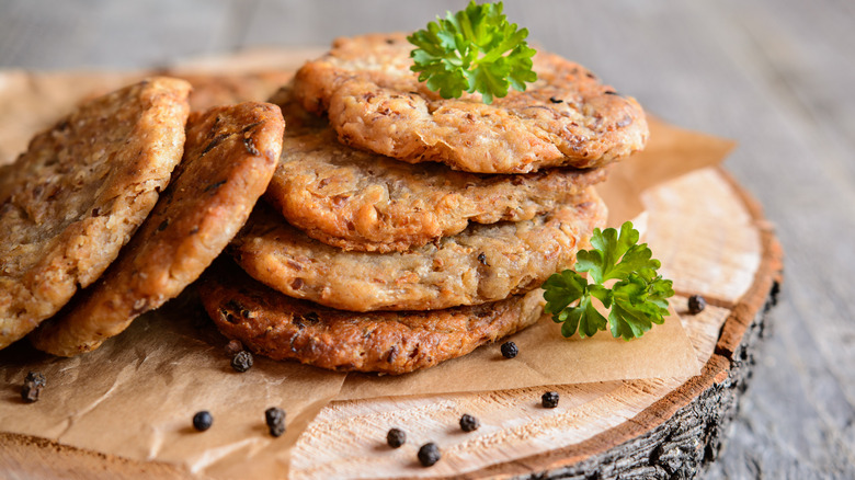 Sauerkraut fritter and pork fritters with herbs