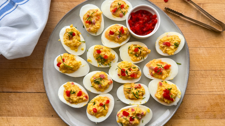 pimento cheese deviled eggs on serving platter