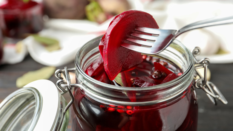 Opened jar of beets