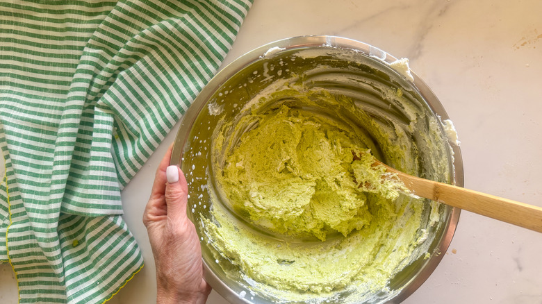 wooden spoon in bowl of mixture