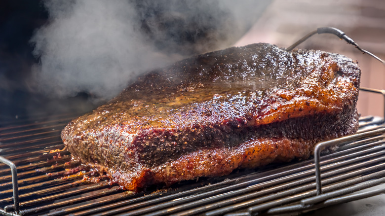 Fresh smoked brisket on the grill.