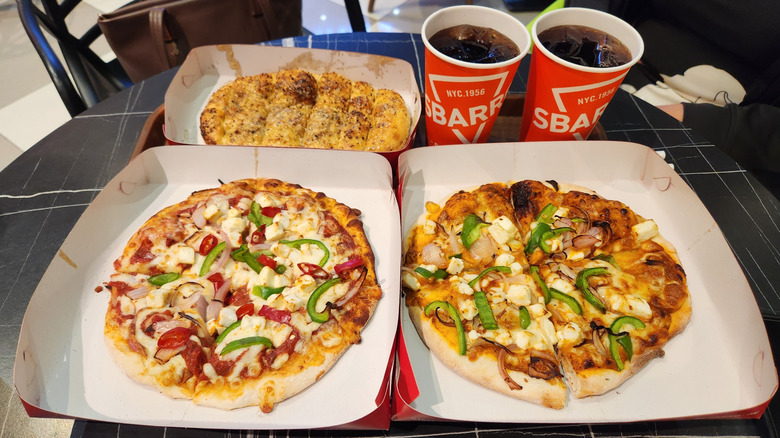 Two pizzas, breadsticks, and drinks from Sbarro
