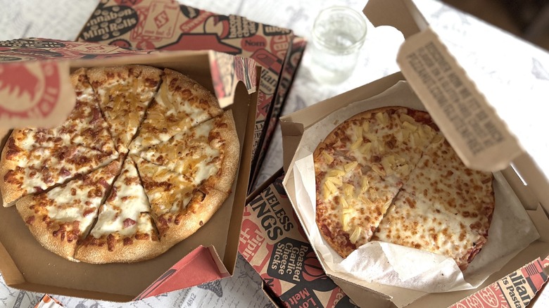 picture of pizzas inside Pizza Hut boxes from above