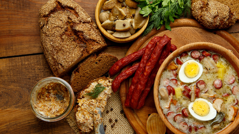 A selection of Polish bread, sausages, and stew.