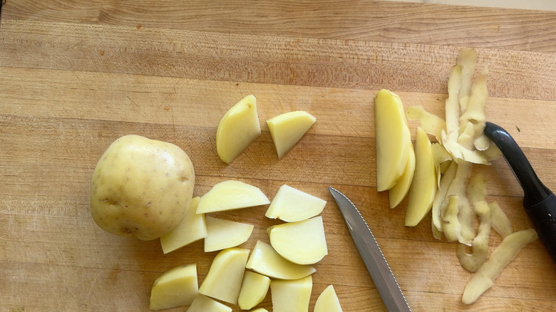 cut potatoes on board